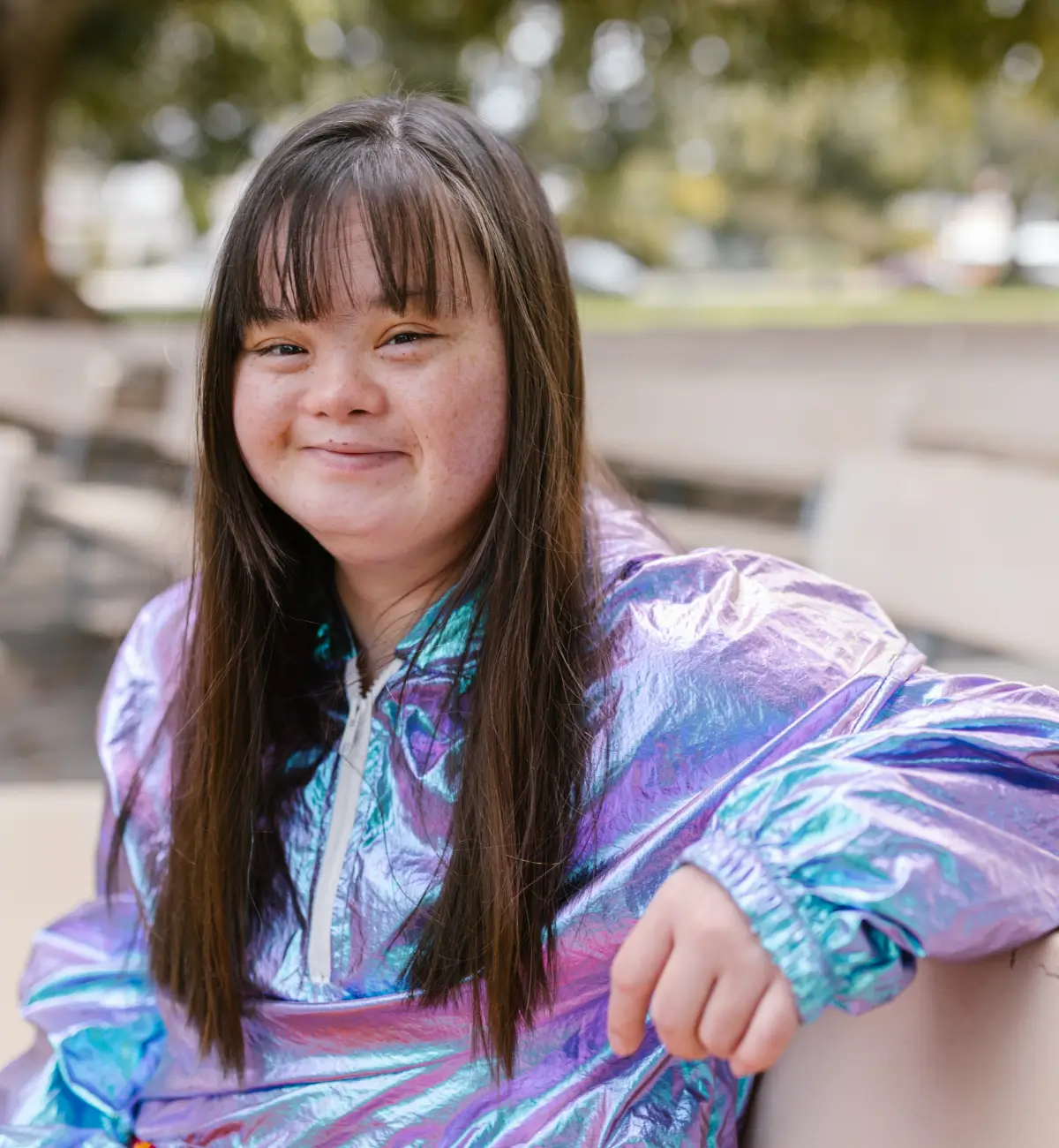 Girl sitting on park bench